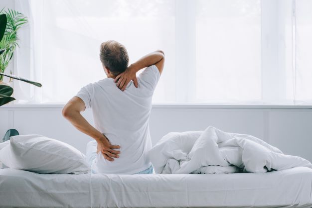 Back pain from uncomfortable mattress