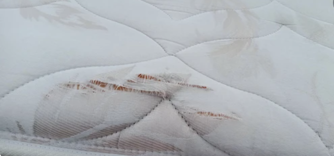 Torn mattress